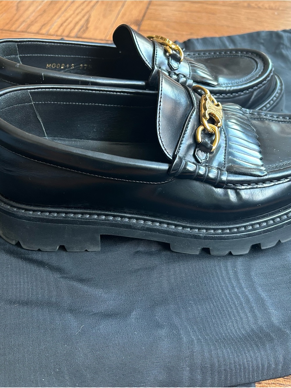 Celine Black Leather Fringe Loafers with Gold Chain Accent - Picture 3 of 9